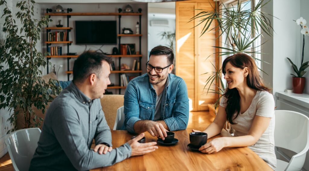 workmates chatting during coffee break