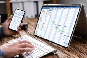 Microsoft Project Gantt Charts on the laptopn and mobile screens